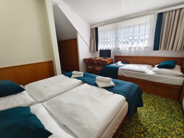 Třílůžkový pokoj v hotelu Sklaní mlýn